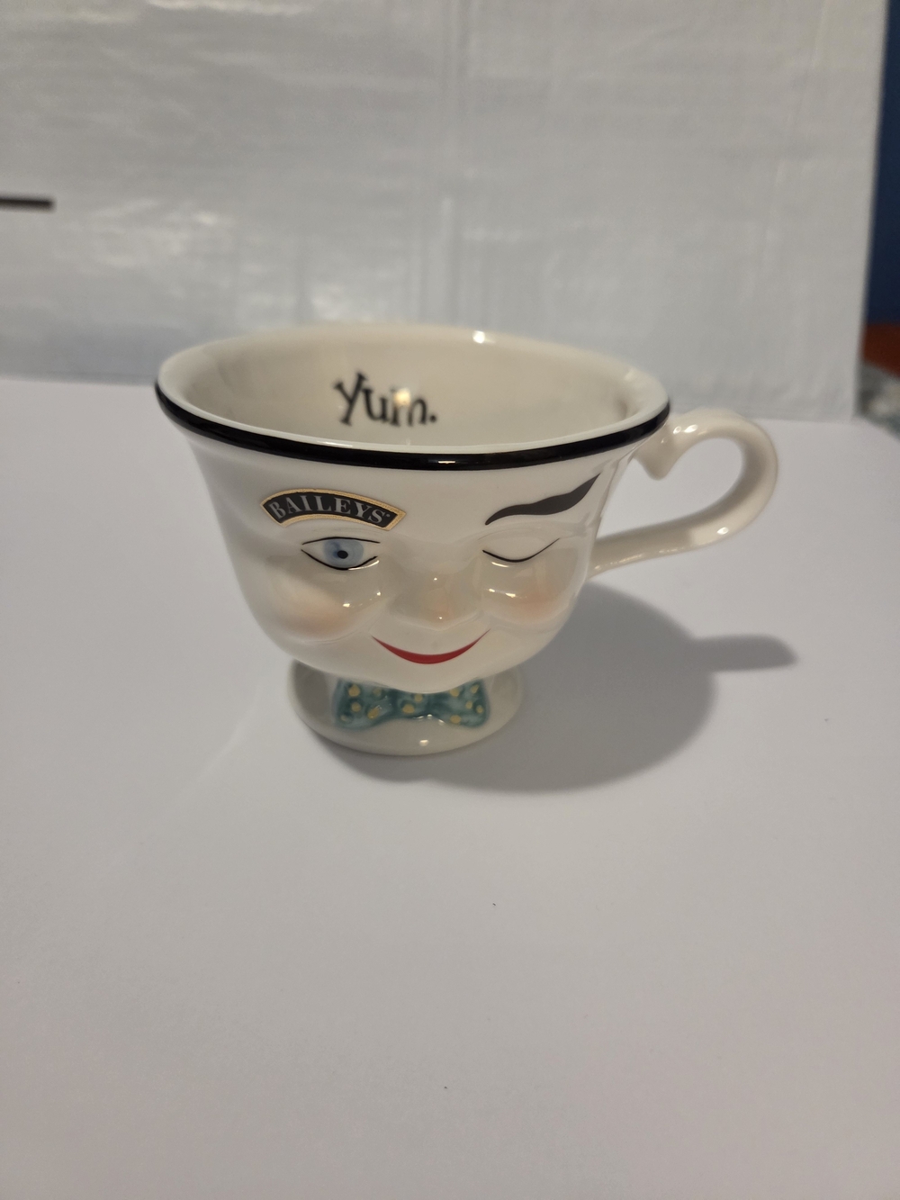 Winking Face Ceramic Pedestal Mug - White
